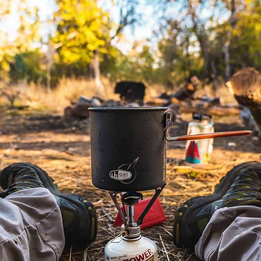 Variety of backpacking stoves showcasing different efficiency levels
